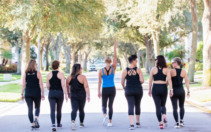 Julie and her BODi team walking